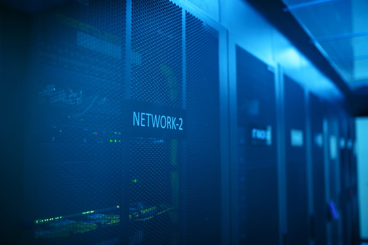 Mastering the First Impression: Your intriguing post title goes here A modern server room featuring network equipment with blue illumination. Ideal for technology themes.